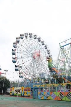 Closeup of multi-coloured Giant Wheel during Dussehra Mela in Delhi, India... Stock Photos