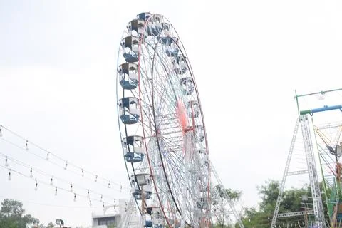 Closeup of multi-coloured Giant Wheel during Dussehra Mela in Delhi, India... Stock Photos