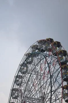 Closeup of multi-coloured Giant Wheel during Dussehra Mela in Delhi, India... Stock Photos