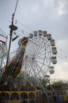 Closeup of multi-coloured Giant Wheel during Dussehra Mela in Delhi, India... Stock Photos
