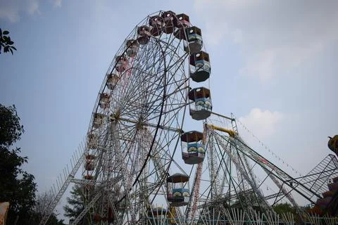Closeup of multi-coloured Giant Wheel during Dussehra Mela in Delhi, India... Stock Photos