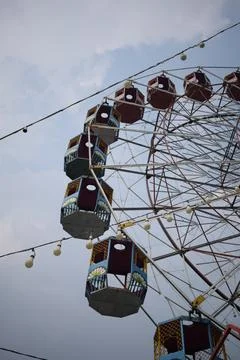 Closeup of multi-coloured Giant Wheel during Dussehra Mela in Delhi, India... Stock Photos