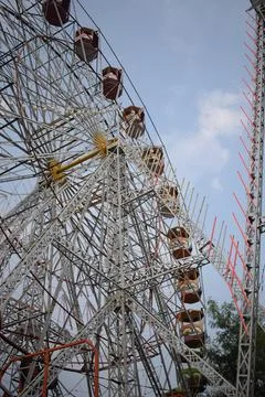 Closeup of multi-coloured Giant Wheel during Dussehra Mela in Delhi, India... Stock Photos