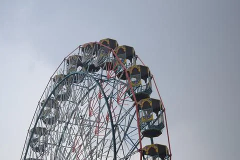 Closeup of multi-coloured Giant Wheel during Dussehra Mela in Delhi, India... Stock Photos