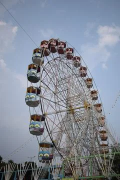 Closeup of multi-coloured Giant Wheel during Dussehra Mela in Delhi, India... Stock Photos