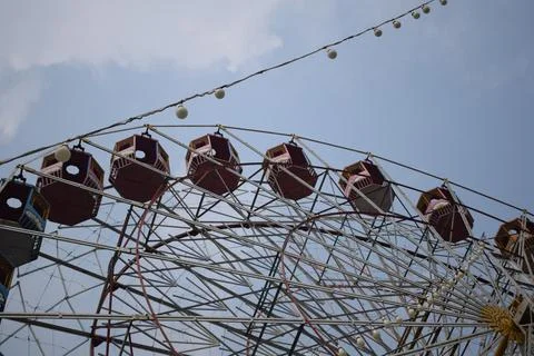 Closeup of multi-coloured Giant Wheel during Dussehra Mela in Delhi, India... Stock Photos