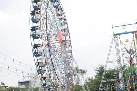 Closeup of multi-coloured Giant Wheel during Dussehra Mela in Delhi, India... Stock Photos