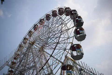 Closeup of multi-coloured Giant Wheel during Dussehra Mela in Delhi, India... Stock Photos