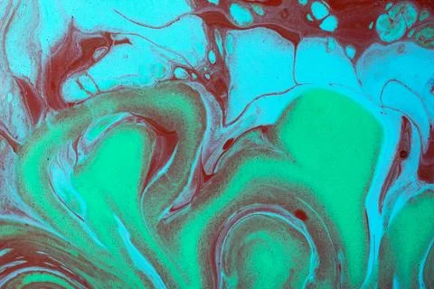Closeup of multicolor abstract marbling texture. Hand painted beautiful patte Stock Photos