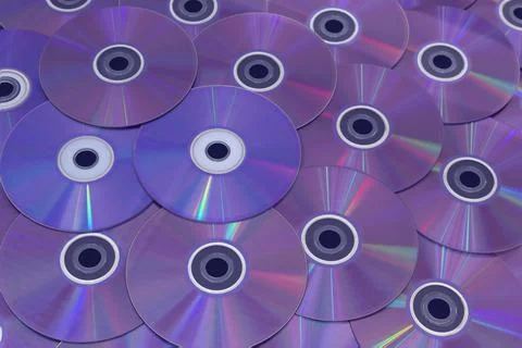 Closeup to a multicolor Compact Disc and DVD collage Stock-Fotos