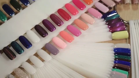 Closeup of nail templates polished with the different colors Stock Footage 73445958