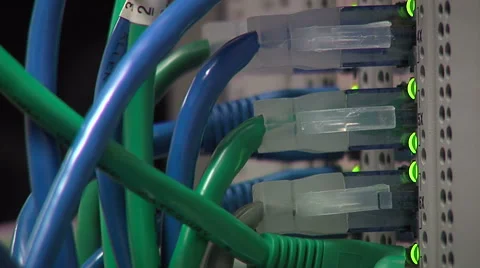 Closeup of network cords connected, lights blinking Video stock 49864625