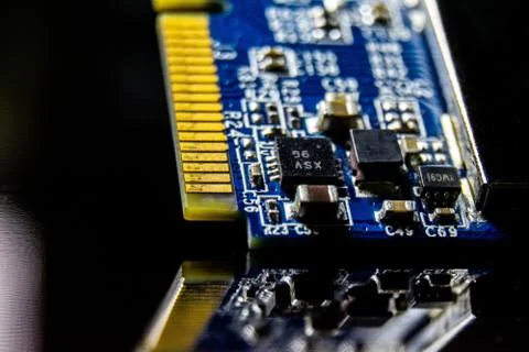 Closeup of a Network Interface Card for computers on the table under the ligh Stock Photos
