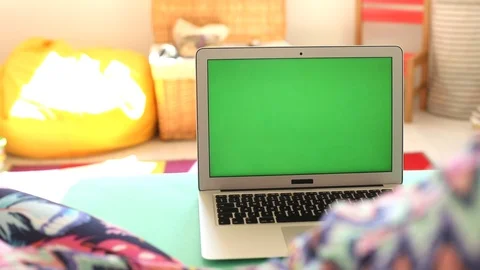 Closeup notebook blank chroma key display with sunny kids room on background 스톡 동영상 109287702