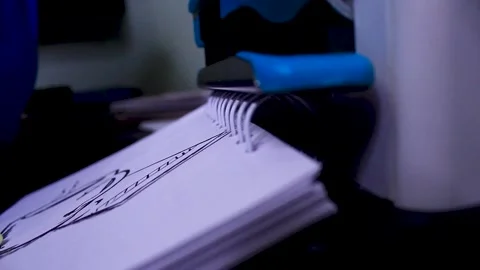 Closeup Notebook is bound by thin metal wire. Spiral bound notebook Stock Footage 150403987