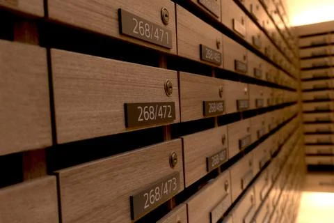 Closeup of numbered mailboxes and lockers in raw in the condo. Stock Photos