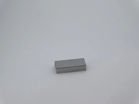 Closeup of an object staple pin isolated on white background Stock Photos