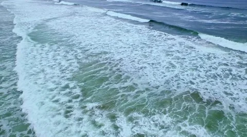 Closeup of ocean waves on a windy mourning Stock Footage 52136673