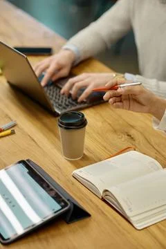 Closeup office workers hand over desk table during business meeting Stock Photos