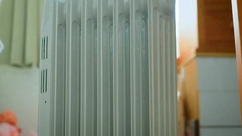 Closeup oil radiator sections storing and releasing heat. Electric heater design Stock Footage 340326644