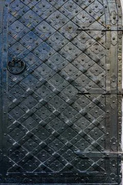 Closeup of the old door with fancy pattern Stock Photos