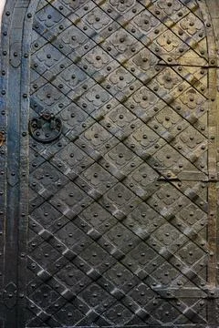 Closeup of the old door with fancy pattern Stock Photos