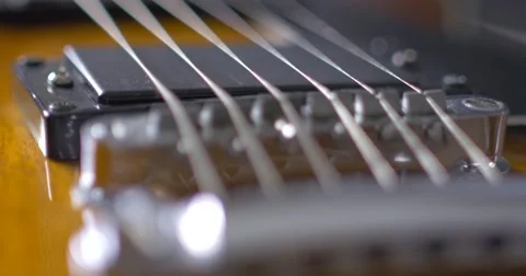 Closeup of old electric guitar - macro 1 Stock Footage 63410280