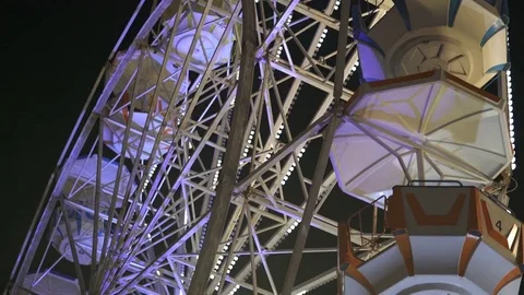 Closeup old ferris wheel at night Stock Footage 70980952