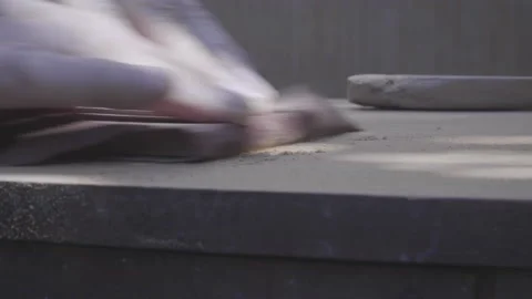 Closeup of old man hand sanding old wooden furniture Stock Footage 140294459