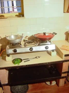 Closeup of old middle class or poor families small kitchen interior view. Stock Photos