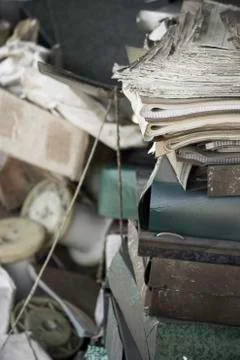 A closeup of old notebooks, documents and cardboard boxes Stockfoto's