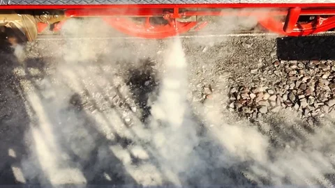 Closeup of an old train with valve blowing steam Stock Footage 95755456
