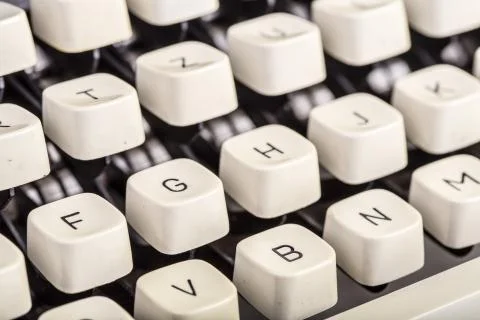 Closeup of old typewriter letters Stock Photos