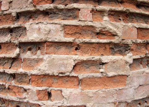 Closeup of the old wall of the destroyed bricks Stock Photos