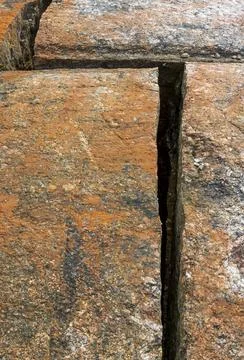 Closeup of one angular crack on bedrock surface 스톡 사진