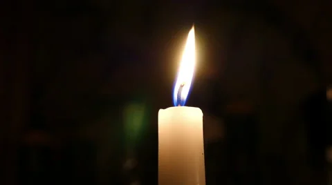 Closeup of one candle 4k Stock Footage 42493864