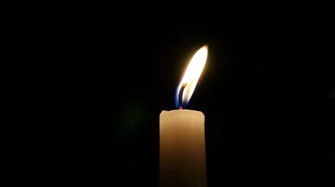 Closeup of one candle on black Stock Footage 41794518