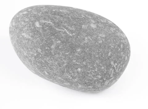 Closeup of one rock on plain background Stock Photos