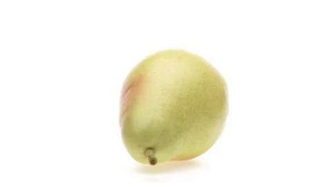 Closeup of one whole pear is rotating. Isolated on the white background. Stock Footage 166240674