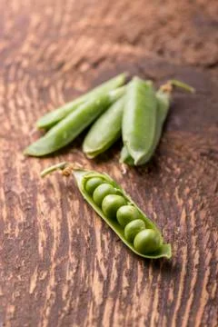 Closeup of an open raw pea Stock Photos