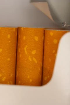 Closeup of an Opened Cigarette Packet, Focused on the Filters Stock Photos
