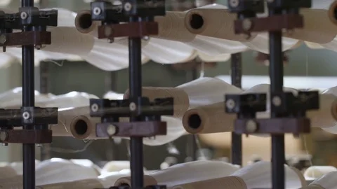 Closeup Operating Spinning Machine with White Thread Bobbins Stockbeeldmateriaal 72566491