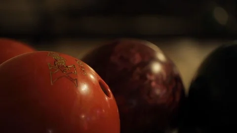 Closeup of Orange and Red Bowling Balls Stock Footage 114017802