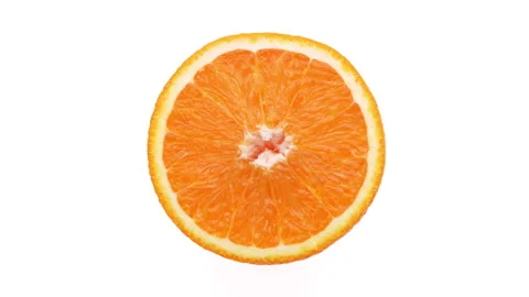 Closeup of orange fruit slice rotating on white background. Stock Footage 158911478