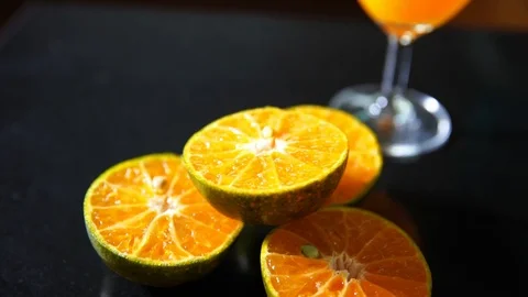 Closeup orange juice on table in kitchen Stock Footage 91935906