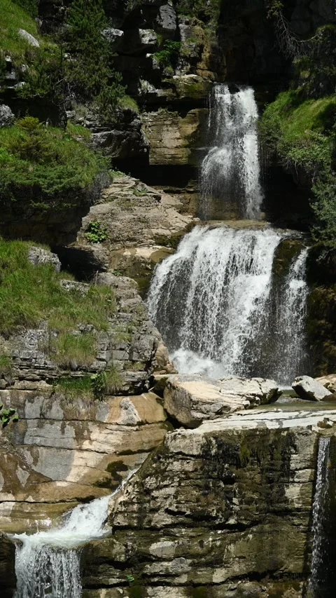 Closeup ot a threefold waterfall in summer, vertical shot Video stock 260869528
