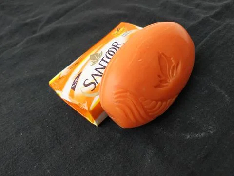 Closeup Pack Closed and Opened Santoor Sandal and Turmeric Soap isolated on.. Stock Photos