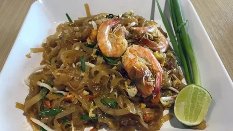 Closeup Pad Thai Shrimp Prawn Stir Fried Noodle Dish, Traditional Street Food Видео 233229078
