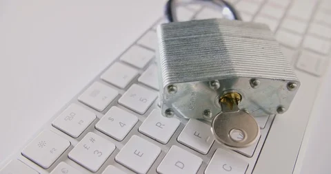 Closeup Of Padlock And Computer Keyboard At Table Stock Footage 86084683