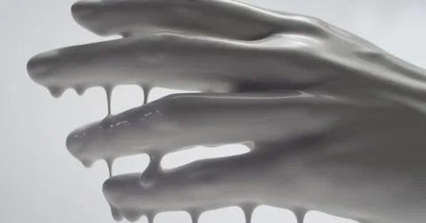 Closeup of a paint colored hand Stock Footage 64910975